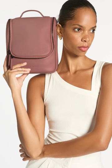 Drifting Apart Toilet Bag