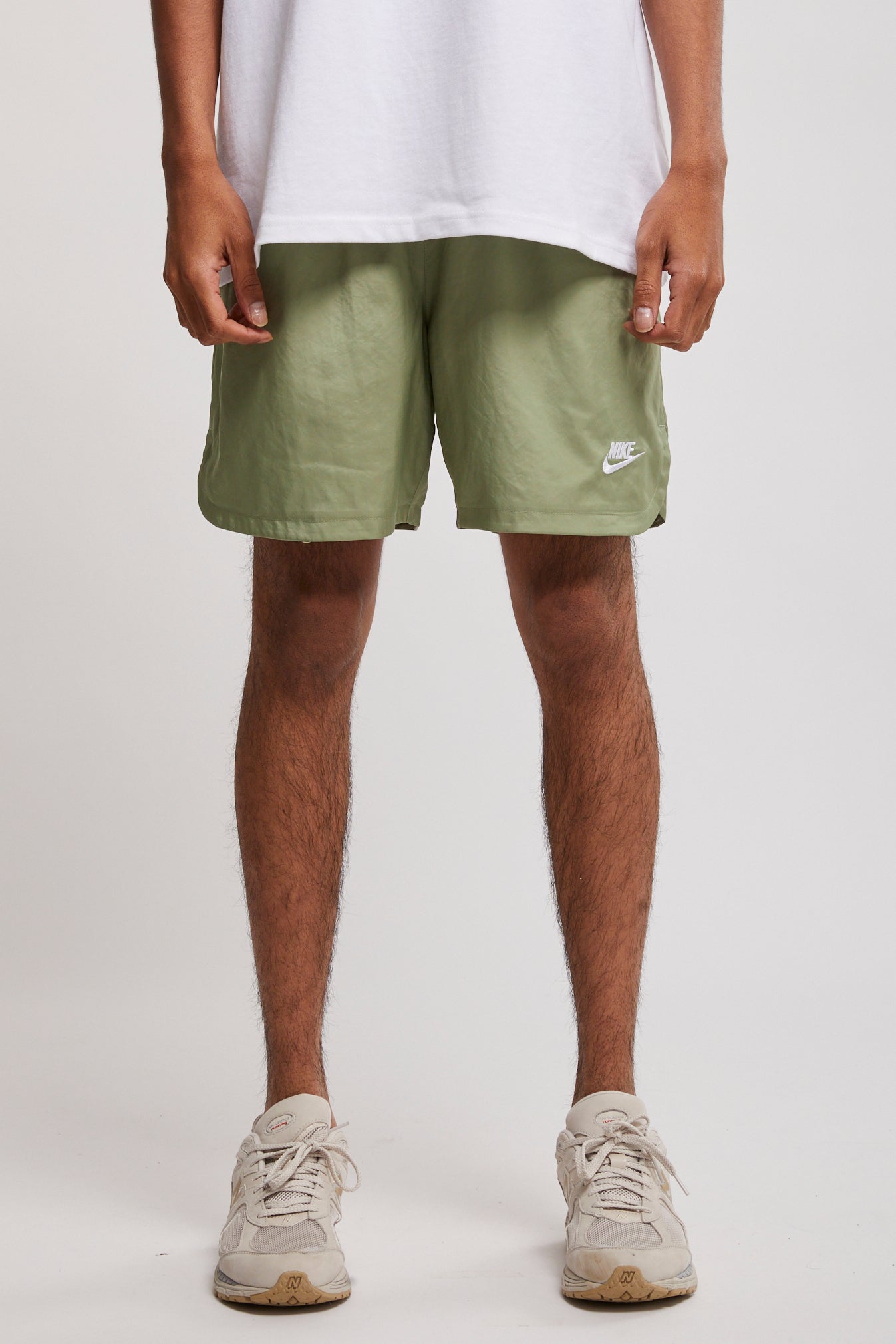 olive green nike woven shorts