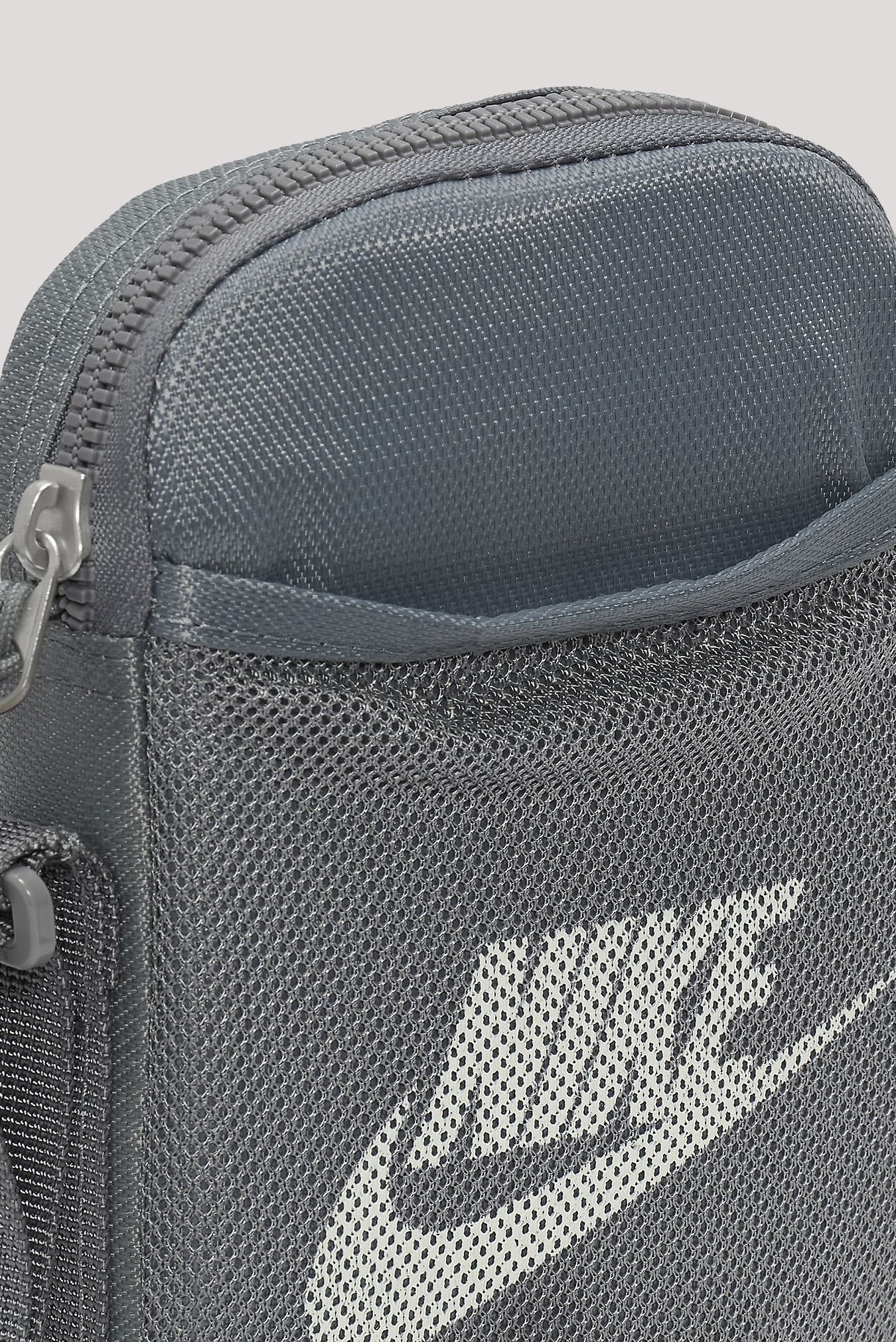 grey nike side bag