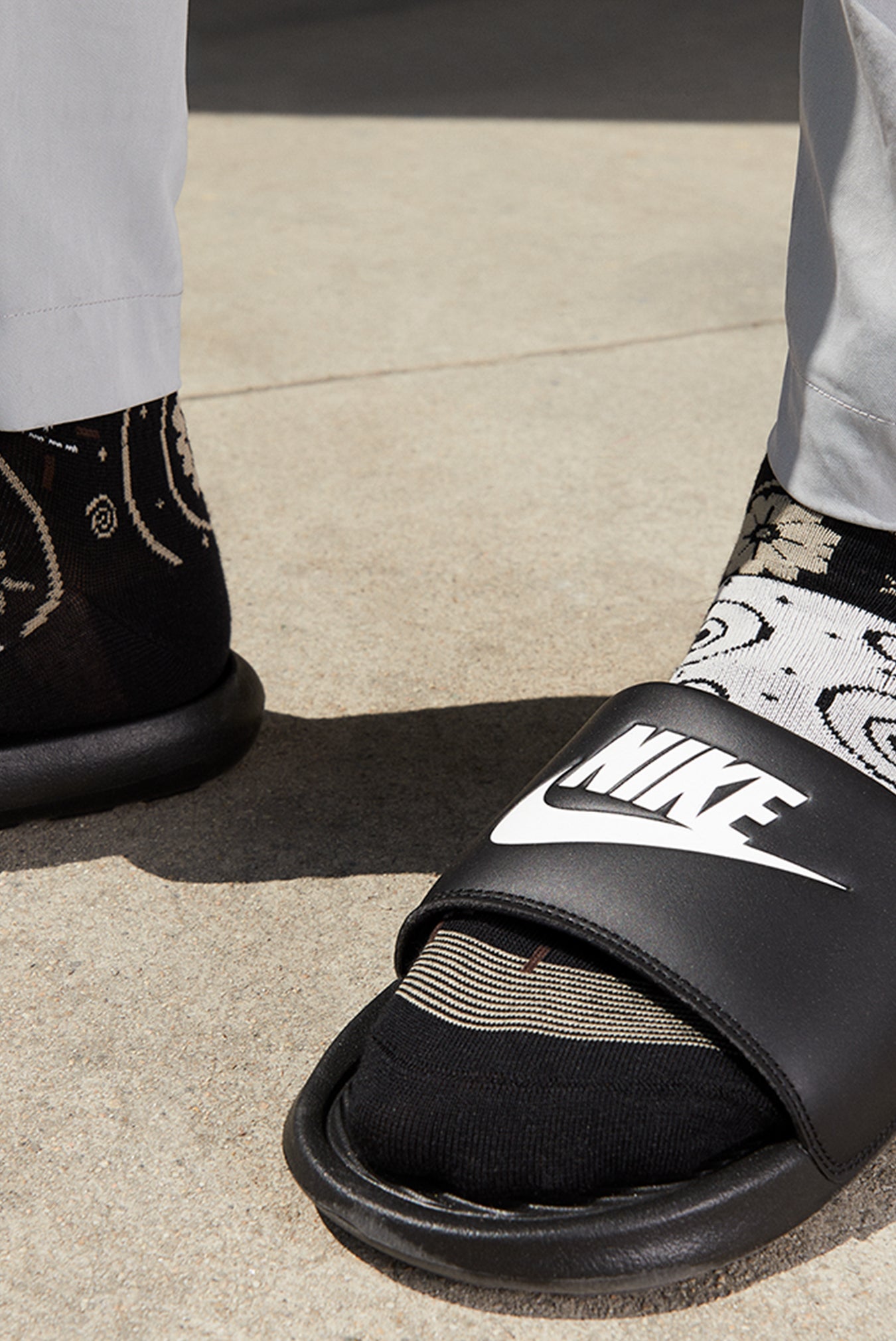 nike victori one slide on feet