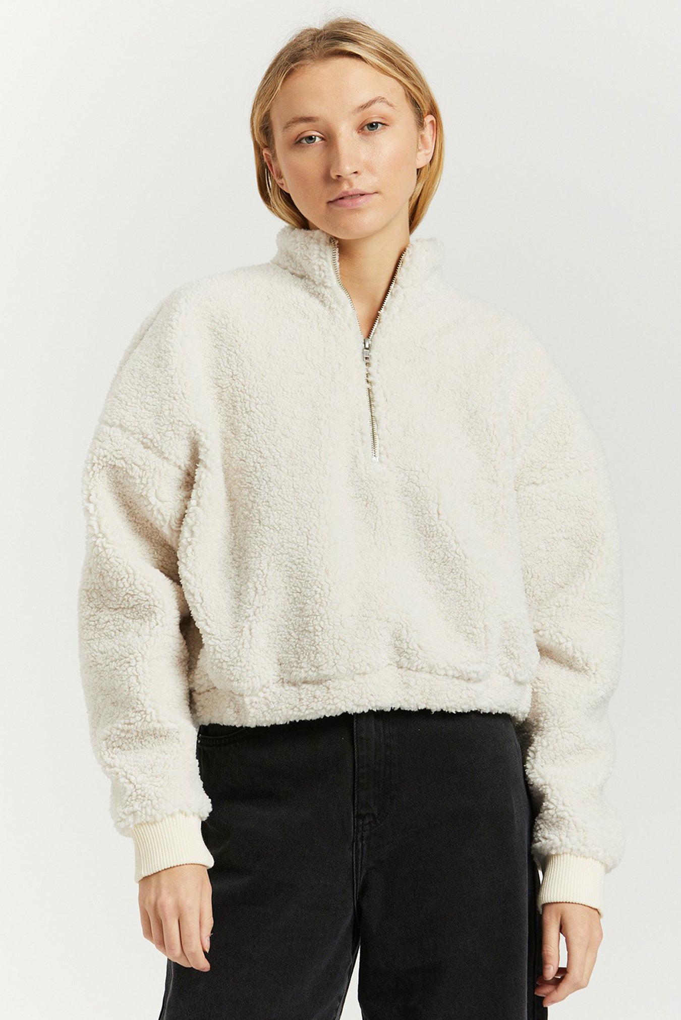 white teddy sweater