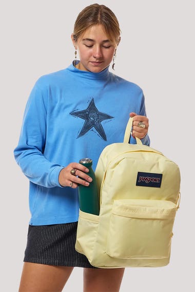 jansport backpack on woman Superbreak Go big with the JanSport Big Student backpack JanSport Backpacks NZ | Backpacks